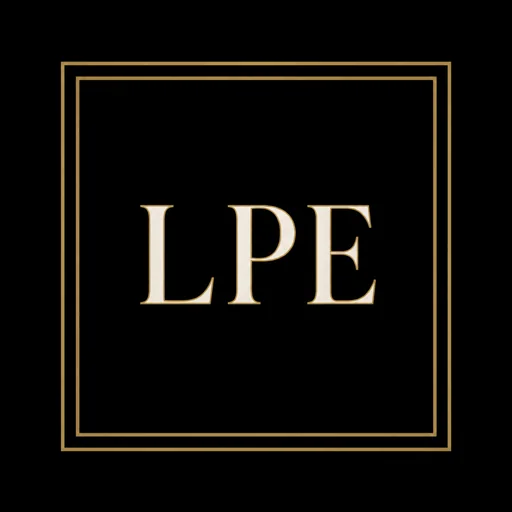 Luxury Premier Estates LPE monogram in ivory and brushed brass on an obsidian field.